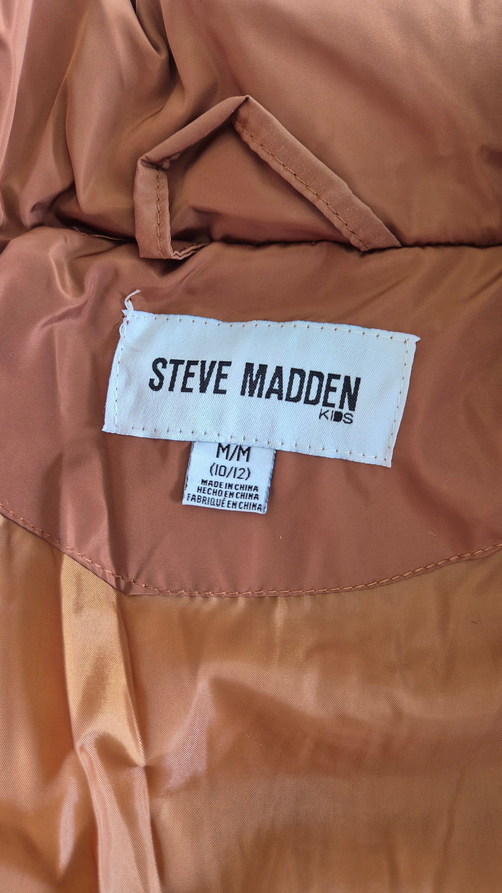Wichtel Outlet Steve Madden kids quilted jacket interior label in copper brown showing size M 10/12